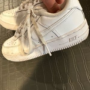 Kids unisex white Nike Air Force one sneakers! Size 12. Worn a few times only.